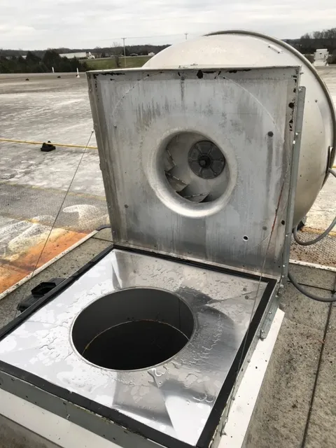 Wheaton hood cleaning technician servicing a commercial kitchen exhaust system